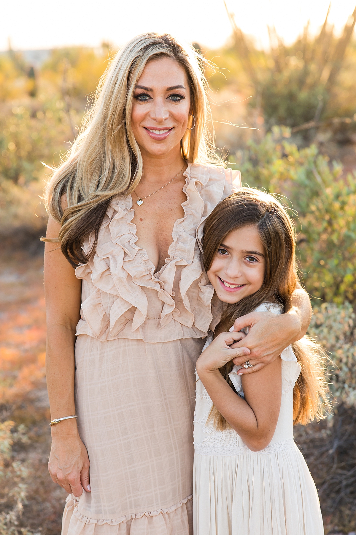 Leah Hope Photography | Scottsdale Arizona Family Photographer | Phoenix Arizona Family Pictures | Desert Landscape Cactus Mountains Scenery | Sunset Natural Light | What to Wear | How to Pose | Family Poses | Styling Outfits for Pictures | Family Photos | Family Posing Ideas | Family Color Scheme Palette | Coordinating Outfits | Golden Hour Sunlight | Family Photo Shoot Outfit Inspiration